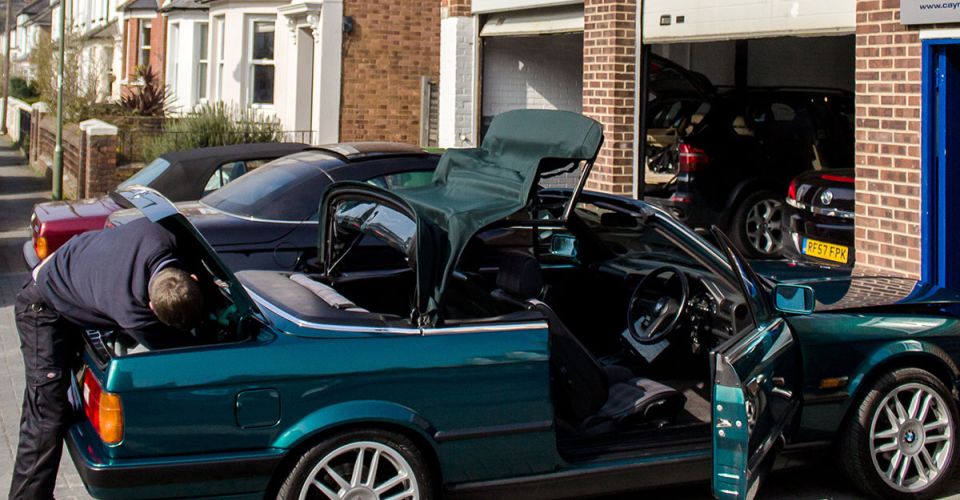soft top convertible roof being fixed