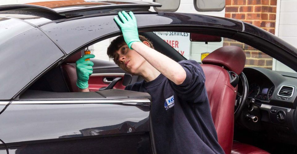 hard top convertible roof being fixed